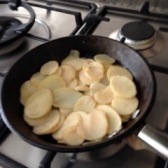 Potato slices cooking