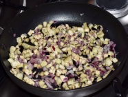 Onions & aubergines diced & cooking
